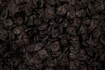 Dried black grape berries in the stock