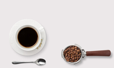 Obraz na płótnie Canvas Coffee with coffee beans and spoon on a white background