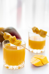Fresh juice in a glass close-up. Juice shallow depth of field.