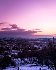 The city of Pecs at a purple sunset in Hungary, Europe