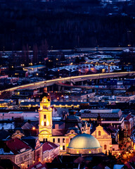 Aerial night view of the Downtown Candlemas Church of the Blessed Virgin Mary in Pecs, Hungary