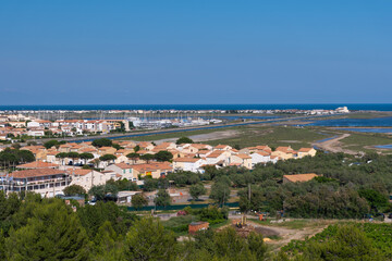 The beach of the chalets of Gruissan at the edge of the Mediterranean in France in the Aude
