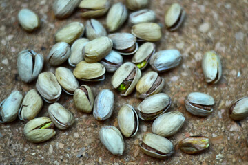 pistachios on wooden background