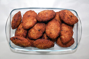 liver cutlets on a light plate. close up . Homemade cutlets on a white plate and white background . Fried Kotleta closely. Kotleta cutlet with mashed .