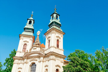 Fototapeta na wymiar Two steeples of The Church of St. Jan Nepomucky at Skalka. Prague, Czech Republic