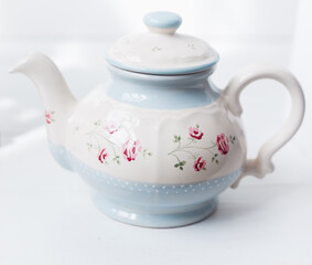 Vintage teapot on white background