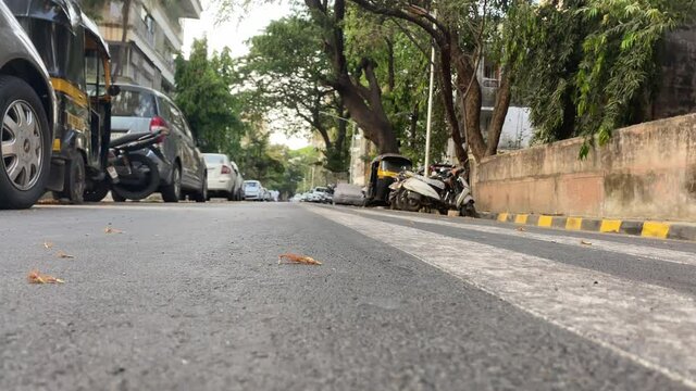 Vehicles parked on an Empty road