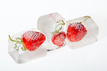 Strawberry frozen in ice