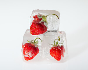 Strawberry frozen in ice