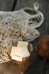 In the hands of white coconut marmalade.
