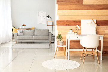 Table and sofa in interior of living room