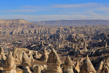 The magnificent Cappadocia valley with its rocky structure formed by volcanic tuffs. Nevsehir, Turkey