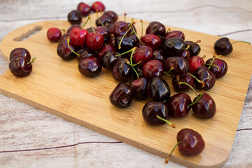 Red Cherries. pile of ripe cherries with stalks