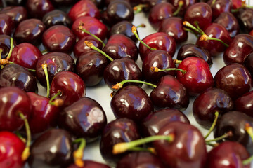 Red Cherries. pile of ripe cherries with stalks