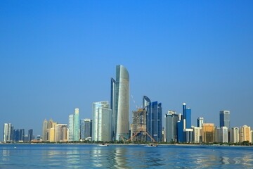 Fototapeta na wymiar Panoramic view of Dubai city from the coast of the heritage village, towers.