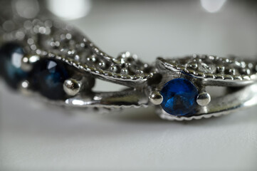 Blue sapphires in an engagement ring with zircons.