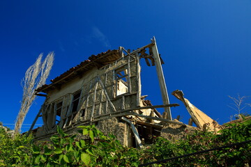 Ruined mud brick house in an earthquake. Iznik, Turkey.