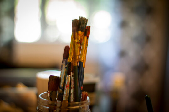 Paint Brushes in a Mason Jar - Powered by Adobe