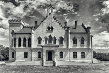 Stari Lec, Serbia - June 04, 2020: Kapetanovo is a Neo-Gothic castle located in the village of Stari Lec, in the Plandiste municipality in northeastern Serbia.