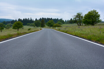 Country road between  nature and with sky