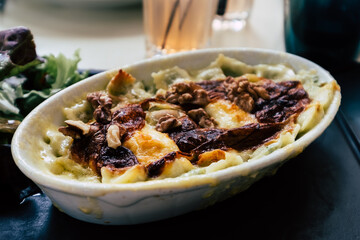 Gratin de ravioles au fromage et crème fraiche