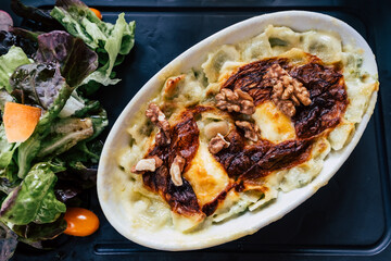 Gratin de ravioles au fromage et crème fraiche