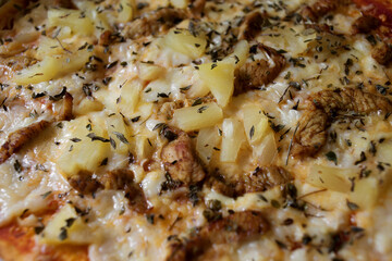 pizza with chicken and pineapple - close up