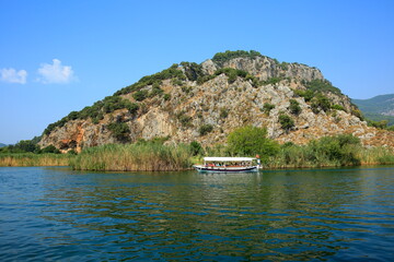 Visitors going by boat to the protected Iztuzu beach in Dalyan, known as the area where the turtle turtles lay eggs, are increasing every year.