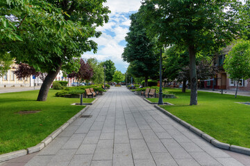 Obraz premium Vrsac, Serbia - June 04, 2020: The pedestrian zone in Vrsac, Serbia. Centuries old meeting place of the townsfolk. Russian Park.