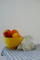 Still life composition with some peaches