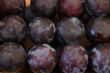 Black plums in the grocery stock