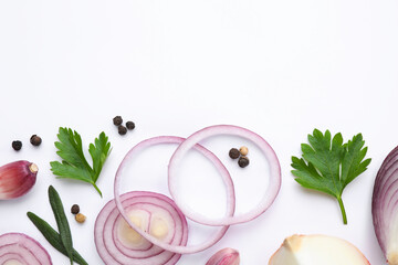 Flat lay composition with cut onion and spices on white background