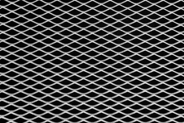 Rusty metal grid with geometric pattern of rhombi, black and white  background