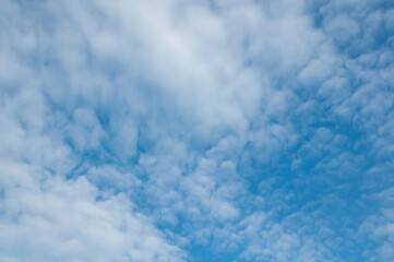 White clouds on a blue sky. Beautiful natural background
