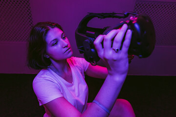 The girl joins virtual reality. VR games