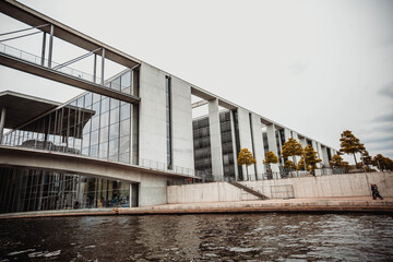 Panoramic view of Berlin government district with excursion boat on Spree river 