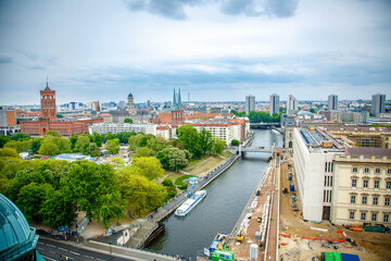 Obraz premium The Berlin cathedral and Fernsehturn television tower stand side by side as respected icons of the city. Perspective corrected panorama detailed when viewed large.