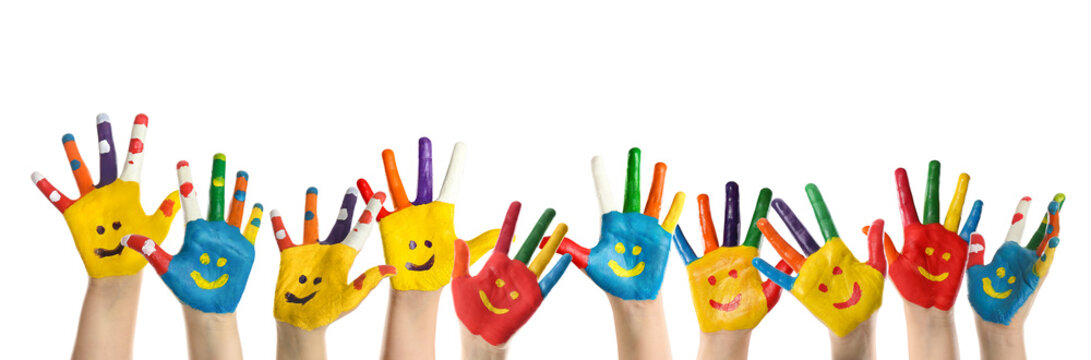 School holidays. Children with painted palms on white background, closeup