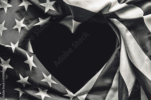 The concept of black and white american, July 4th Independence Day in America, USA  flag in shape of heart - space for text national public holiday card