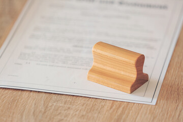 Document and stamp on table of notary public