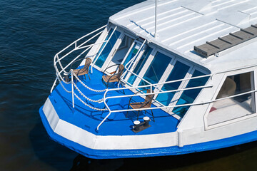 The bow of the ship. Fragment of the hull of a river pleasure boat. Water transport.