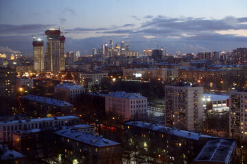 Fototapeta na wymiar Evening in the city. Moscow apartments in the evening. Business Center Moscow City. Moscow. Russia.