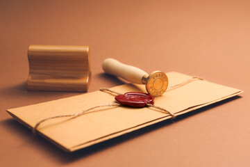 Envelope with notary public stamps on color background