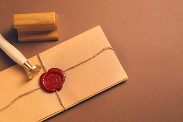 Envelope with notary public stamps on color background