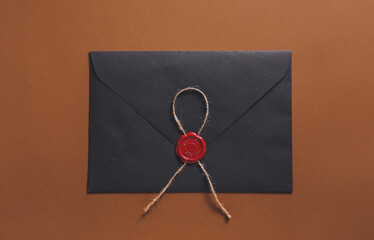 Envelope with notary public wax seal on color background