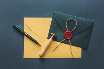 Envelopes with notary public wax seal on table