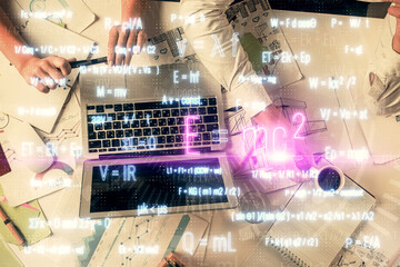 Double exposure of man and woman working together and math formulas hologram drawing. Education concept. Computer background.