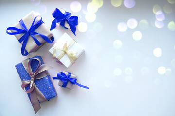 Present gift boxes with bow on white background.