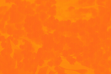Orange gradient abstract patchy background with plants patern