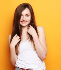 Portrait of young positive female with cheerful expression